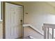 Exterior shot of the front door showing digital lock and unit number 13-203 at 8481 W Union Ave # 13203, Denver, CO 80123