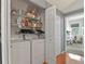 Convenient laundry room with washer, dryer, and ample storage space at 8481 W Union Ave # 13203, Denver, CO 80123