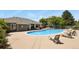 Refreshing community pool with comfortable lounge chairs and a covered area for relaxation and enjoyment at 8481 W Union Ave # 13203, Denver, CO 80123