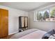 Bedroom with closet and large window at 2546 S Stuart St, Denver, CO 80219