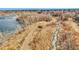 Scenic view of neighborhood walking path winding along the lakeside, fostering active lifestyles at 17478 E Rice Cir # D, Aurora, CO 80015