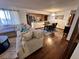 Combined living and dining area featuring an open floor plan and hardwood flooring at 9088 W 88Th Cir, Westminster, CO 80021