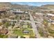 Aerial view of property in a city neighborhood, framed in yellow, showcasing its location near mountains and urban amenities at 1914 Washington Ave, Golden, CO 80401