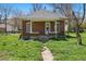 Charming brick home with a cozy front porch and well-maintained stone pathway at 1914 Washington Ave, Golden, CO 80401