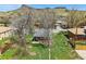 Charming bungalow with a front yard, mature trees, and mountain views at 1914 Washington Ave, Golden, CO 80401
