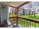 Outside deck with chair and exterior view of building at 8666 Decatur St # 254, Westminster, CO 80031