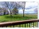 Green community lawn area and landscape viewed from exterior deck at 8666 Decatur St # 254, Westminster, CO 80031