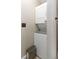 Efficient stacked washer and dryer unit tucked neatly in the laundry area at 8666 Decatur St # 254, Westminster, CO 80031
