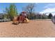Bright and colorful playground with multiple play structures and equipment at 8666 Decatur St # 254, Westminster, CO 80031