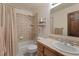 Bathroom features a shower-tub combo, a modern vanity, and tiled walls at 493 Cr 672, Breckenridge, CO 80424