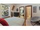 Cozy bedroom featuring a view of the window, wooden furniture, and closet at 493 Cr 672, Breckenridge, CO 80424