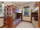 Bunk room featuring cozy beds with wood frames, large windows, and soft carpet flooring at 493 Cr 672, Breckenridge, CO 80424