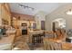 Charming kitchen featuring wooden cabinets, an island with seating, and plenty of natural light at 493 Cr 672, Breckenridge, CO 80424