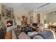 Cozy living room with a stone fireplace and plush sofas, with an open layout perfect for relaxing at 493 Cr 672, Breckenridge, CO 80424