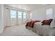 Spacious bedroom featuring many windows that allow for ample natural light and mountain views at 938 Hearteye Trl, Lafayette, CO 80026