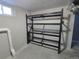 Basement with shelving unit for storage at 2480 S Bannock St, Denver, CO 80223