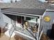 House exterior featuring a covered porch and sun decor at 2480 S Bannock St, Denver, CO 80223