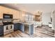 Stylish kitchen featuring stainless steel appliances, granite countertops, and an open layout at 23882 E Alabama Dr, Aurora, CO 80018