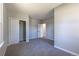Comfortable bedroom with a closet and neutral carpet, offering a serene space for rest and relaxation at 5195 Allison St, Arvada, CO 80002