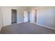Inviting bedroom with a closet and adjacent bathroom, providing convenience and privacy for a restful retreat at 5195 Allison St, Arvada, CO 80002