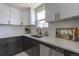 Kitchen featuring stainless steel appliances, white countertops and cabinets at 5195 Allison St, Arvada, CO 80002