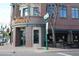 Street-level view of Braun Taphaus & Grille with brick facade, outdoor seating, and inviting signage at 5195 Allison St, Arvada, CO 80002