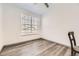 Simple bedroom with a ceiling fan, window with blinds, and neutral tones at 18657 Stroh Rd # 4103, Parker, CO 80134