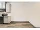 Kitchen featuring stainless steel appliances, and an adjacent blank wall at 18657 Stroh Rd # 4103, Parker, CO 80134