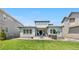 Beautiful backyard with a patio seating area perfect for entertaining at 9340 Mount Jackson St, Littleton, CO 80125