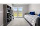 Bright bedroom with mountain views, large window, and a comfortable daybed at 9340 Mount Jackson St, Littleton, CO 80125
