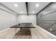 A spacious game room features a ping pong table and decorative wall at 9340 Mount Jackson St, Littleton, CO 80125