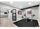 A home gym features work out equipment and a sitting area off to the side at 9340 Mount Jackson St, Littleton, CO 80125