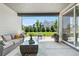 Outdoor patio area with comfortable seating and a view of the yard at 9340 Mount Jackson St, Littleton, CO 80125