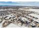 Aerial view of a residential neighborhood showcasing houses and a school at 7260 Fallon Cir, Castle Rock, CO 80104