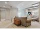 Finished basement with comfortable seating and large TV at 7260 Fallon Cir, Castle Rock, CO 80104
