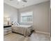Basement bedroom with a double bed and neutral decor at 7260 Fallon Cir, Castle Rock, CO 80104