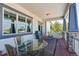 Deck with glass-top table and chairs, overlooking scenic views at 7260 Fallon Cir, Castle Rock, CO 80104