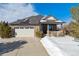 Beautiful ranch home with stone accents and a large front porch at 7260 Fallon Cir, Castle Rock, CO 80104