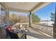 Spacious covered porch with seating area, perfect for relaxing at 7260 Fallon Cir, Castle Rock, CO 80104