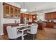 Spacious kitchen with an island, stainless steel appliances, and ample cabinetry at 7260 Fallon Cir, Castle Rock, CO 80104