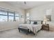 Spacious main bedroom with large windows and comfortable bedding at 7260 Fallon Cir, Castle Rock, CO 80104