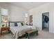 Main bedroom with king bed, walk-in closet, and ensuite bath at 7260 Fallon Cir, Castle Rock, CO 80104