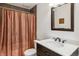 Bathroom with updated vanity, toilet, and shower at 795 S Alton Way # 5D, Denver, CO 80247