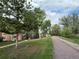 Exterior shot of a charming complex with well-manicured lawns and mature trees at 795 S Alton Way # 5D, Denver, CO 80247