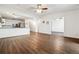 Spacious living room with open floor plan and hardwood floors at 795 S Alton Way # 5D, Denver, CO 80247