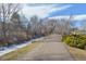 Scenic walking path near the home with trees and a creek offering a tranquil outdoor experience at 795 S Alton Way # 5D, Denver, CO 80247
