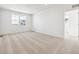 Spacious bonus room with neutral carpeting and large windows at 6575 N Nepal St, Aurora, CO 80019