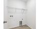 Laundry room with wire shelving and vinyl flooring at 6575 N Nepal St, Aurora, CO 80019