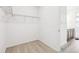 Bright walk-in closet with wire shelving and carpeted floor at 6575 N Nepal St, Aurora, CO 80019