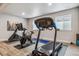 Home gym featuring cardio machines and plenty of space to workout at 8890 S Quatar Ct, Aurora, CO 80016
